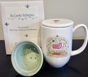 Pottery tea mug with strainer and lid